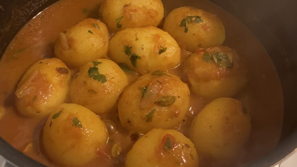 Half way cooked aloo dum 