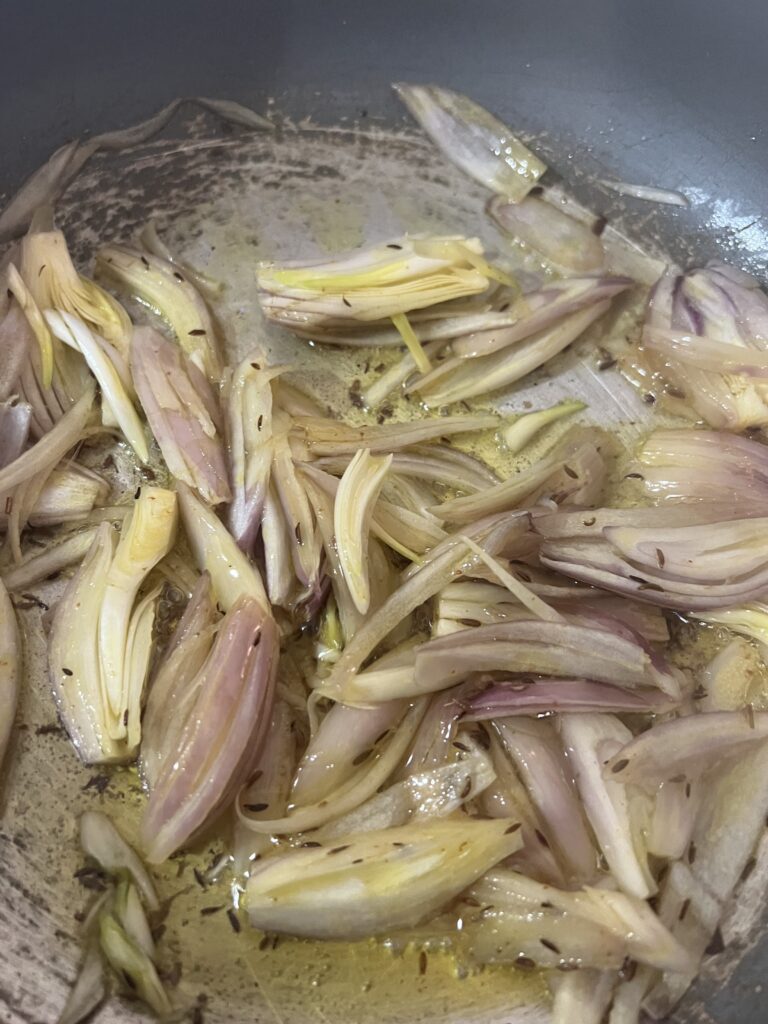 added onion, salt and cumin to the oil. 